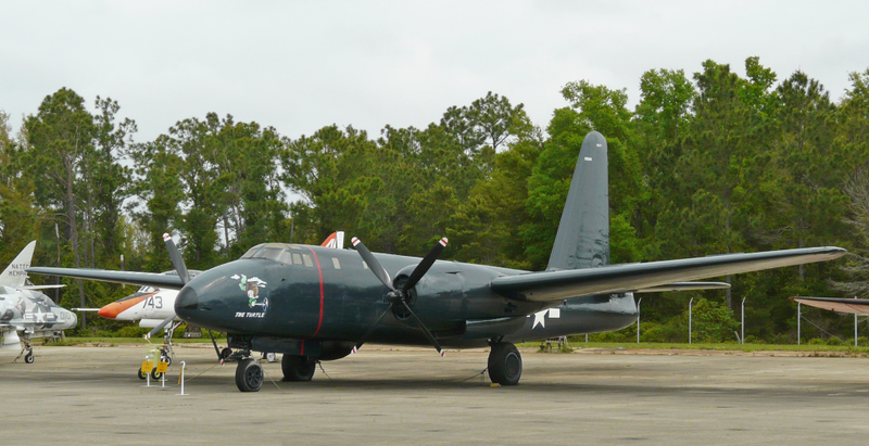 Red Line is a warning stripe to stay away from the propellers. Later Neptunes had a different nose, additional jet engines, a magnetic anomaly detector or MAD boom, and anti submarine radar.